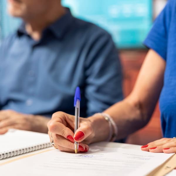 Person completing an online loan application: benefits of borrowing online in Canada
